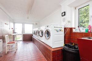 COMMUNAL LAUNDRY- click for photo gallery